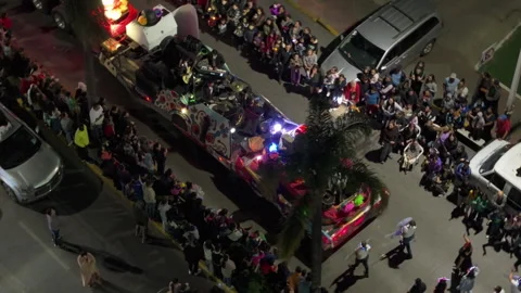Aerial View of Decorated Parade Float with Mariachi Band and Colorful Lights. Video stock 337914483