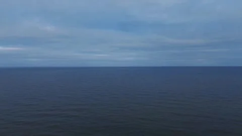 Aerial view of the deep blue Atlantic Ocean in Ireland Stock Footage 303357564