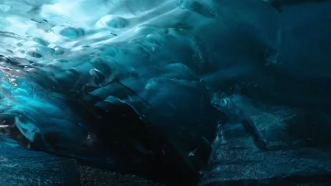 Aerial view of deep blue glacier ice cave, Iceland. Stock Footage 345668762