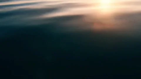 Aerial View of Deep Teal Ocean Waves with Sunlight Reflections 4k Stock Footage 311215206