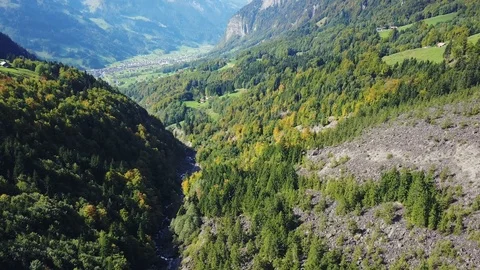 Aerial view of deep valley with wild river. Stock Footage 107083707