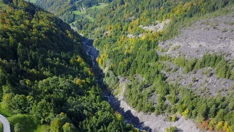 Aerial view of deep valley with wild river. Stock Footage 107084217