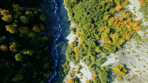 Aerial view of deep valley with wild river. Stock Footage 107085752