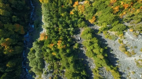 Aerial view of deep valley with wild river. Stock Footage 107085835