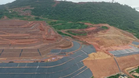 Aerial view of deforestation and open pit mining industry Stock Footage 328919726