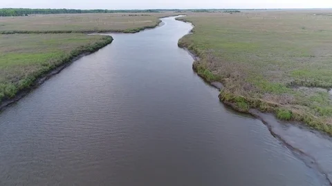 Aerial View of Delaware Bay Marsh in New Jersey Stock Footage 76855931