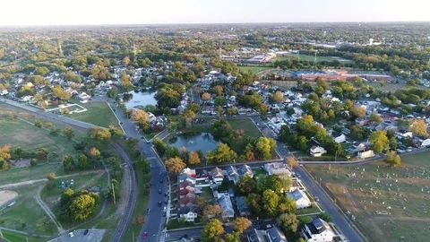 Aerial View of Delaware Riverfront Community and Port City Gloucester New Jersey Stock Footage 81543544