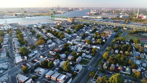 Aerial View of Delaware Riverfront Community and Port City Gloucester New Jersey Stock Footage 81543565