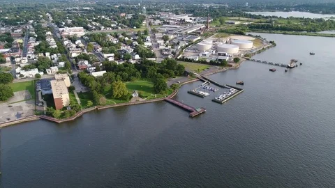 Aerial View of Delaware Riverfront Community and Port City Gloucester New Jersey Stock Footage 81543631