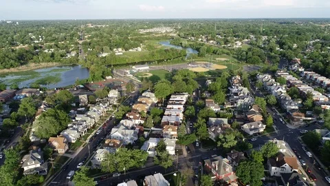 Aerial View of Delaware Riverfront Community and Port City Gloucester New Jersey Stock Footage 89989549