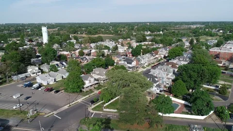 Aerial View of Delaware Riverfront Community and Port City Gloucester New Jersey Stock Footage 89989573