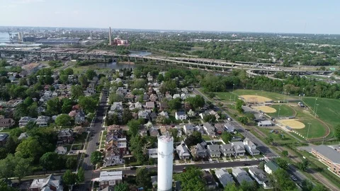 Aerial View of Delaware Riverfront Community and Port City Gloucester New Jersey Stock Footage 89989584