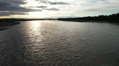 Aerial View Of Denali Over River Into Sunset Tilt Up Stock-Footage 170165798