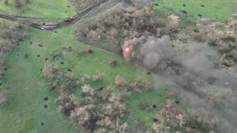 Aerial View of Dense Smoke Columns Rising from Urban Ruins Stockbeeldmateriaal 332358086