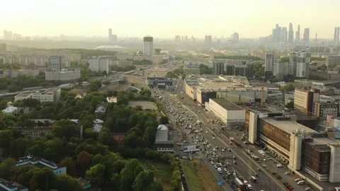 An aerial view of the dense traffic on the third ring in Moscow against the Stock Footage 209864944