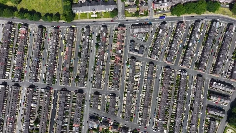 Aerial view of dense Victorian terraced housing in Beeston Leeds West Yorks.. Stock Footage 337394045