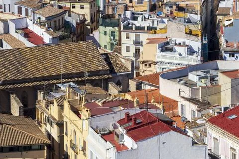 Aerial view of densely packed rooftops in Valencia, showcasing a mix of Stock Photos