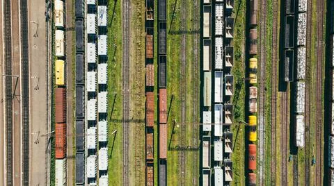 Aerial view the depot station of freight trains with cargo ready for delivery Stock Photos
