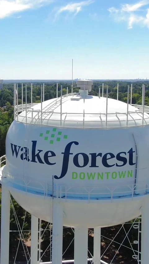 Aerial View Descending on Downtown Wake Forest NC Water Tower Stock Footage 346567945