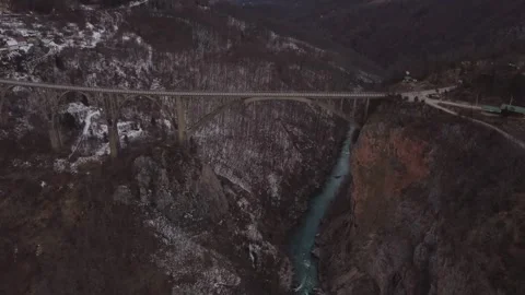 Aerial view descending towards Durdevica Tara Bridge over the deep canyon in Stock Footage 341069146