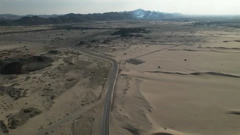 Aerial view of the desert. drone view of highway in the middle of the desert Stock Footage 263277562