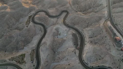 Aerial view of desert mountain windy roads, concept shot for an adventurous road Stock Footage 320244040