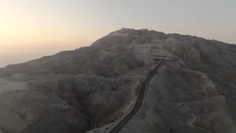 Aerial view of desert mountain windy roads, concept shot for an adventurous road Stock Footage 320244603