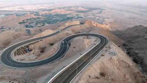 Aerial view of desert mountain windy roads, concept shot for an adventurous road Stock Footage 320244877