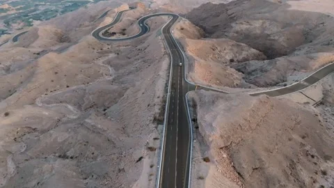 Aerial view of desert mountain windy roads, concept shot for an adventurous road Stock Footage 320244912