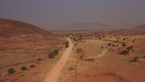 Aerial View of Desert Road Through Namibia Landscape Stock Footage 339501489