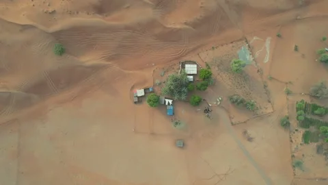Aerial view of a desert settlement in Rub Al Kahli Desert 動画素材 243624290