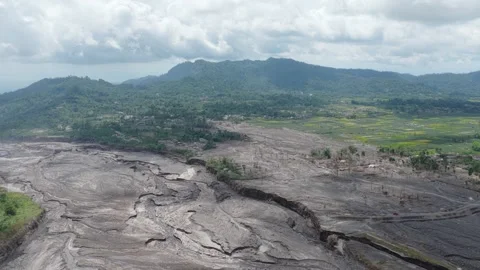 Aerial view of devastation from semeru volcano lava flow Stock Footage 328917856