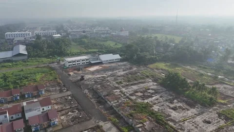 Aerial View of Developing City and Construction Sites in Haze Vídeo Stock 347442137