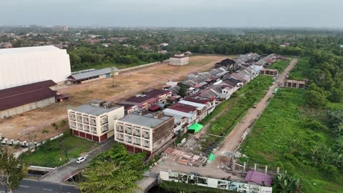 Aerial View of Developing Residential Area and Green Fields Vidéo 347349648
