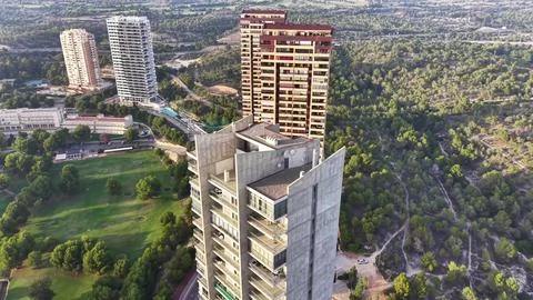 Aerial view of development area, overhead drone footage showcasing building and Stock Photos