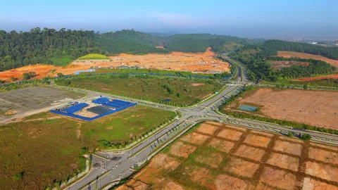 Aerial view of development site in Malaysia at sunny day Stock Footage 303428231