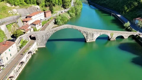 Aerial view of Devils Bridge Ponte della Maddalena Borgo a Mozzano Tuscany Stock Footage 336470131