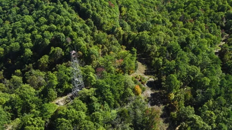 Aerial View Of Devils Knob Fire Lookout Tower In Remote Forested Area In Stockbeeldmateriaal 327615462