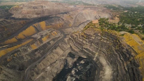Aerial view of Dhanbad’s coal fields, showcasing the expanse of mines and the Stock Footage 299227944