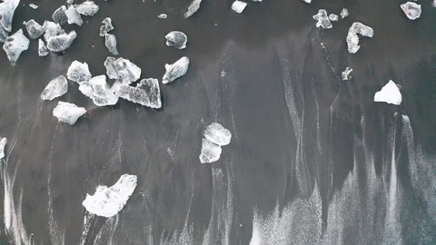 Aerial view of a diamond beach and many ice floes. Iceland. Winter 2019 Stock Footage 123980403