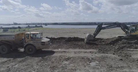 Aerial view of diggers and construction work on the Thames, London Stock Footage 127658973