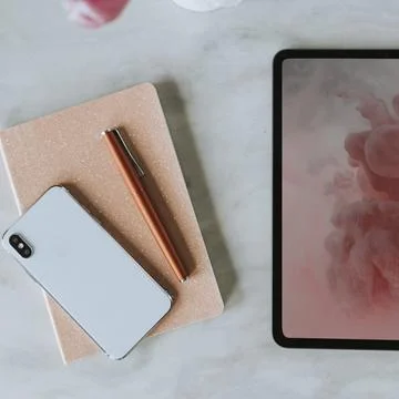 Aerial view of digital devices on table workplace Stock Photos