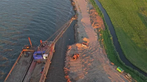 Aerial view of dike reinforcement construction work Stock Footage 342809148