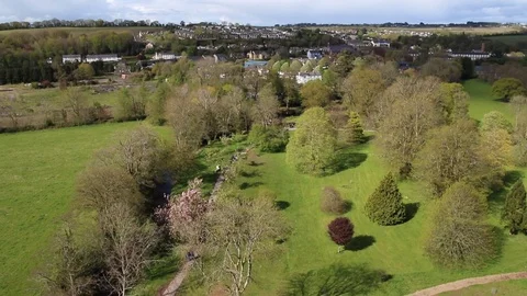 Aerial View of dirt path to city Stock Footage 88961550