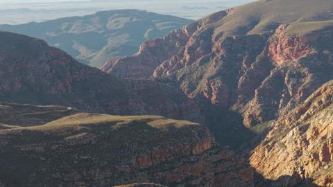 Aerial view of dirt road on mountain pass Stock-Footage 342043931