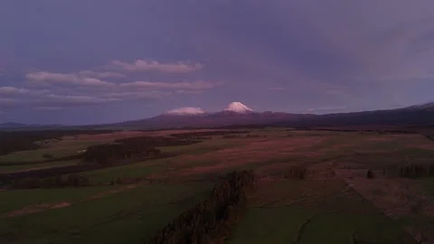 Aerial view of distant snowy Mount Ruape at twilight in Tongariro National Video stock 339123628