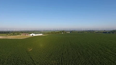 Aerial view of a distant wind farm Stock Footage 77576192