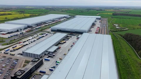 Aerial View of Distribution Center Loading Docks and HGVs in Appleby Magna Stock Footage 345010009