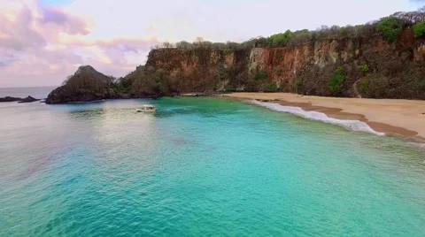 Aerial view of a diving boat floating over the corals on a paradise beach. Stock Footage 57986110