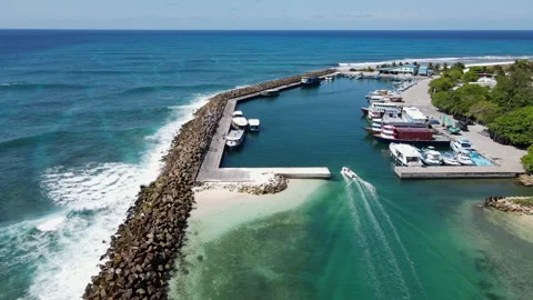 Aerial view of diving boat speeding at Fuvahmulah Harbour, Maldives Stock-Footage 243920921